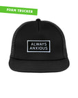 "Always Anxious" in white block text embroidered on black patch with white merrowed edge on a flat brim foam snap back. Art by Print Ritual.